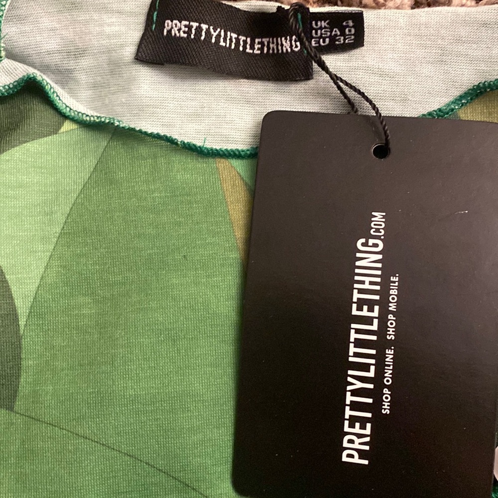Pretty little thing asymmetric psychedelic flared sleeve top in green! - Picture 2 of 2